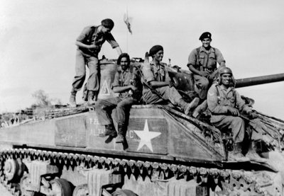 Indian tank crew astride their Sherman by English Photographer